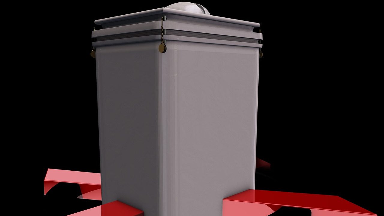 A ballot box sits ready for voters at a polling station.