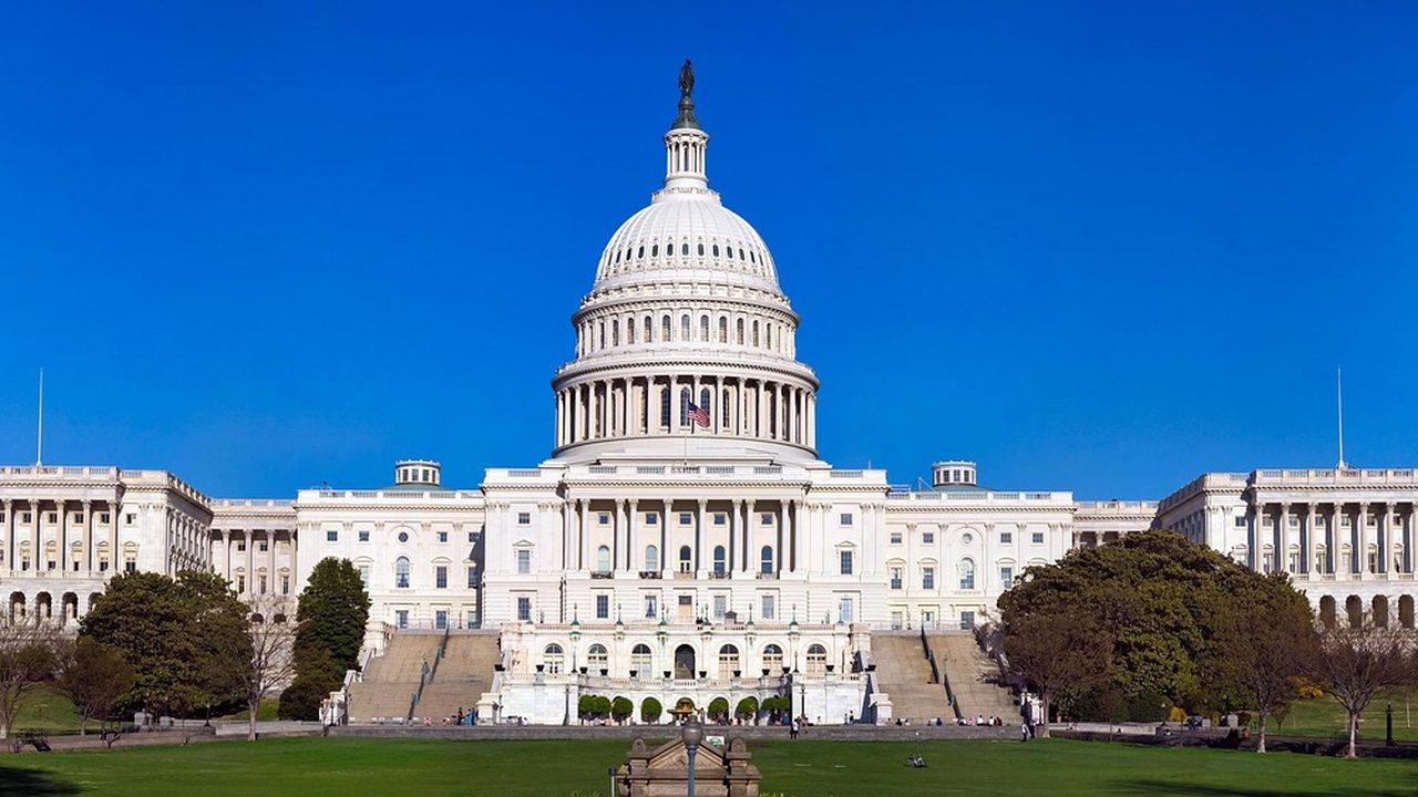 The US Capitol building exterior viewed from the grounds.