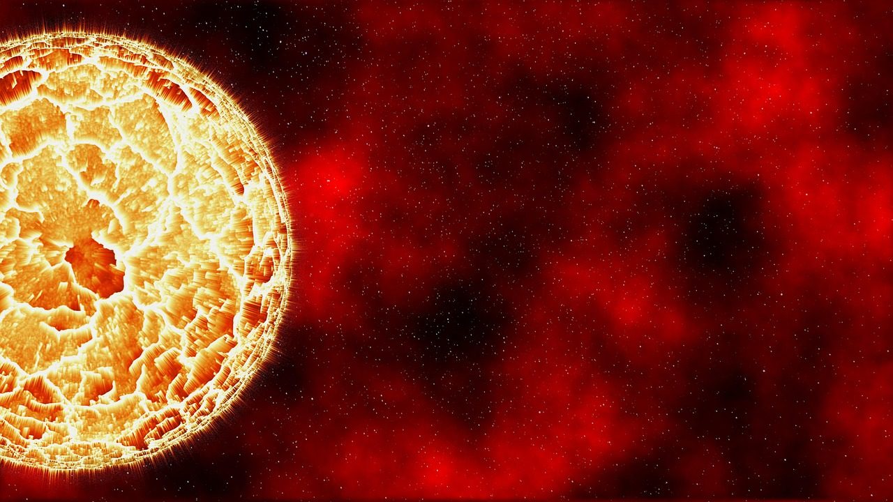 A colorful nebula with bright stars scattered across deep space in a telescope image.
