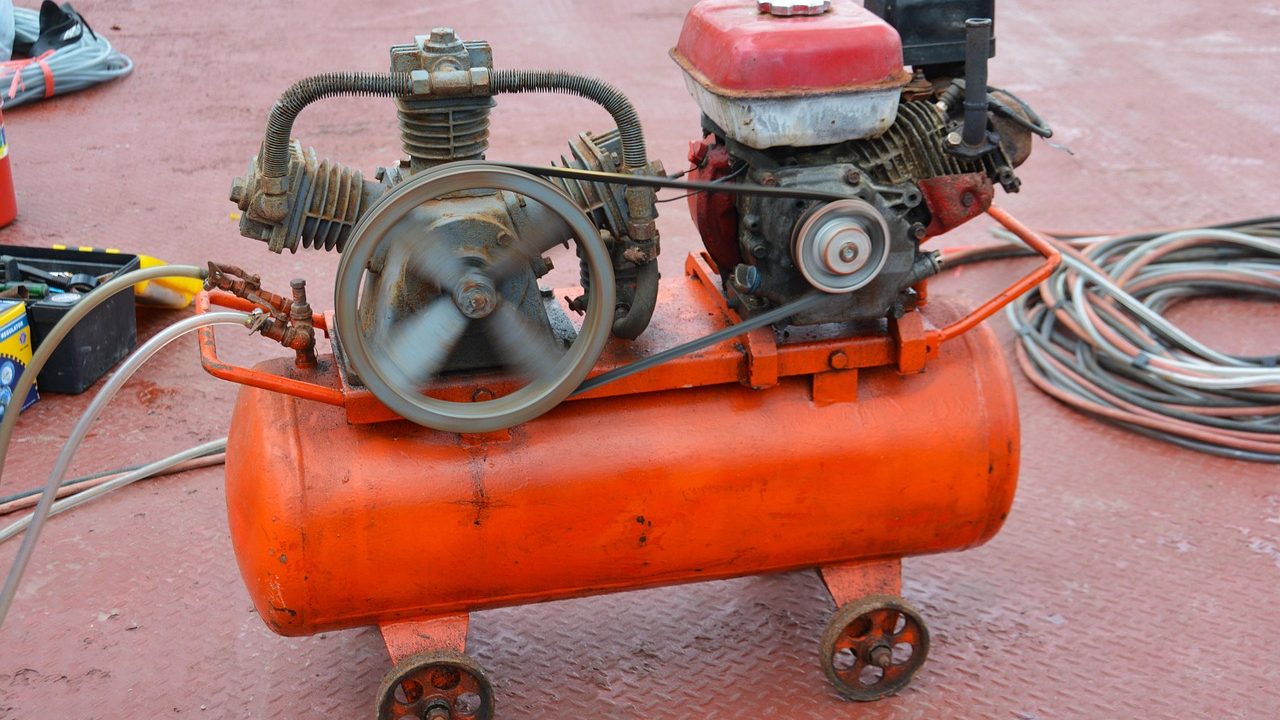 Large industrial diesel generators lined up at an outdoor facility.
