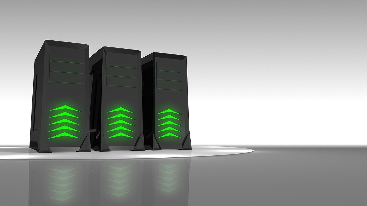 A long corridor of illuminated server racks inside a large data center.