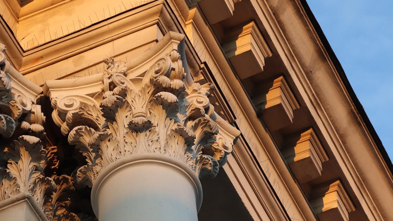 Stone columns on the exterior facade of a classical courthouse building.